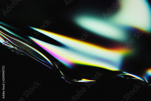 Canvas Print Abstract holographic background with colorful light refraction on liquid surface