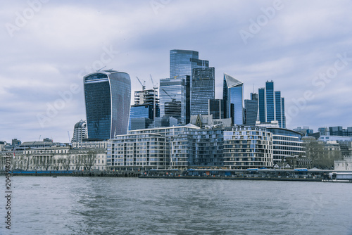 Bild auf Leinwand The City of London skyline across the River Thames, England