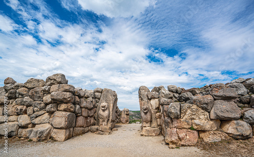 Architectural view of the famous stone-carved Lion Gate at the ancient ruins of Hattusa. The monumental gate represents the master masonry and artistic achievements of the Hittite civilization in Anat