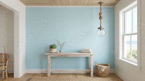 Coastal interior with blue wall and rustic console table
