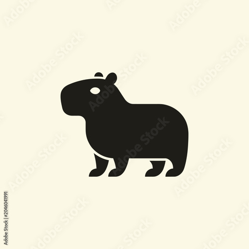 Bild auf Leinwand Black silhouette of a capybara standing.