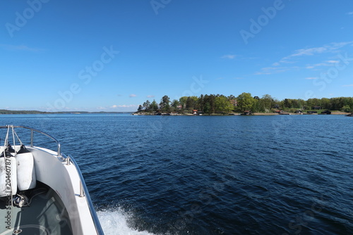 Schilderij op canvas Boat Tour Through the Stockholm Archipelago on a Sunny Summer Day, Sweden