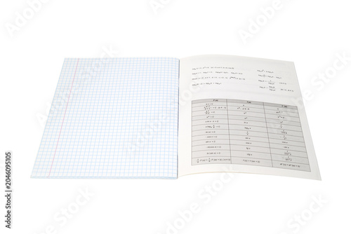 Foto school checkered notebook with mathematical formulas of logarithms and a table o
