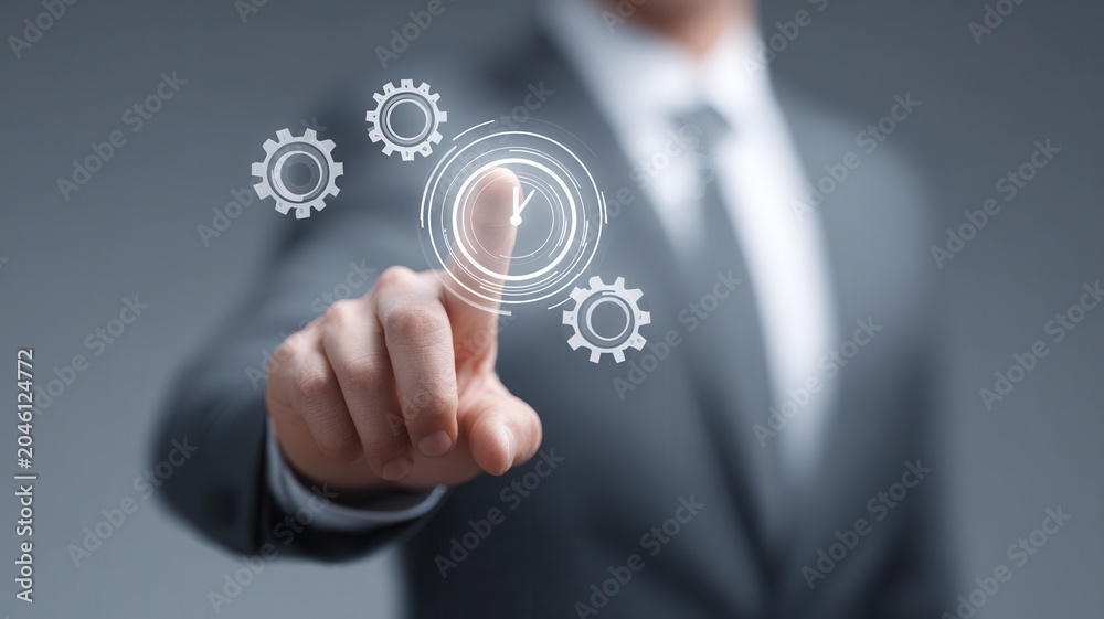 Obraz premium Businessman's hand interacting with a digital interface featuring a clock and gears representing smart planning for success