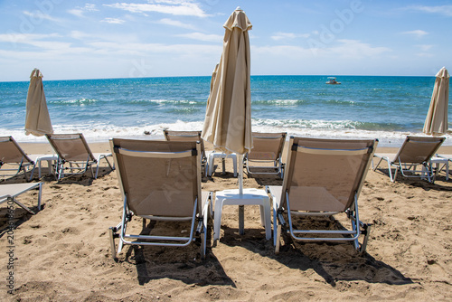 Quadro su tela Empty sun loungers on a sandy beach in Zakynthos, Greece