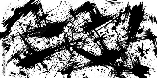 Slika na platnu Abstract black ink splatters and brush strokes create a chaotic and energetic composition on a white background, evoking a sense of raw artistic expression