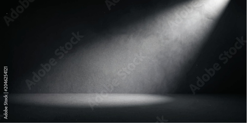 Foto Spotlight in Darkness: A dramatic spotlight illuminates a textured wall and floor in a dark, atmospheric space, creating a sense of mystery and anticipation