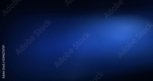 Foto A dark blue background with a bright blue light shining on the right side of the