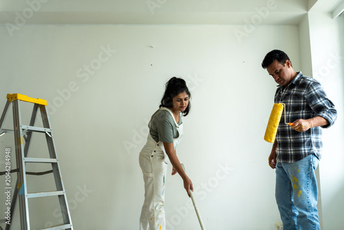 Photography Couple painting home interior photo