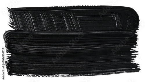A black smudge of mascara on a white background