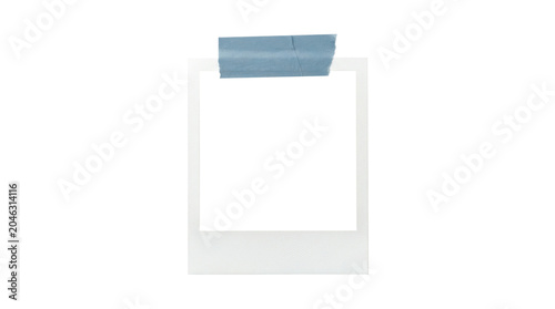 A blank polaroid photo with a blue tape on top isolated on transparent background