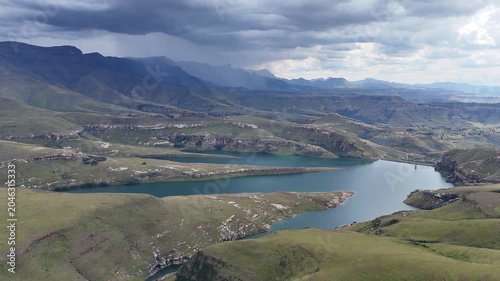 Aerial View South Africa Reservoir Under Brewing Storm Clouds Dramatic Overcast Sky Rolling Mountain Ridges