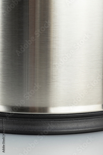 Close-Up of Brushed Stainless Steel Trash Bin Base with Plastic Trim