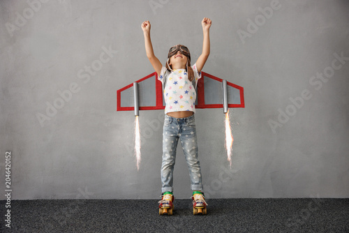 Tableau sur toile Happy child pretend to be astronaut