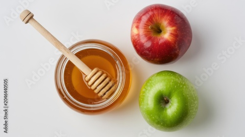 Fresh Apples and Honey in Glass Jar on White Background for Healthy Lifestyle