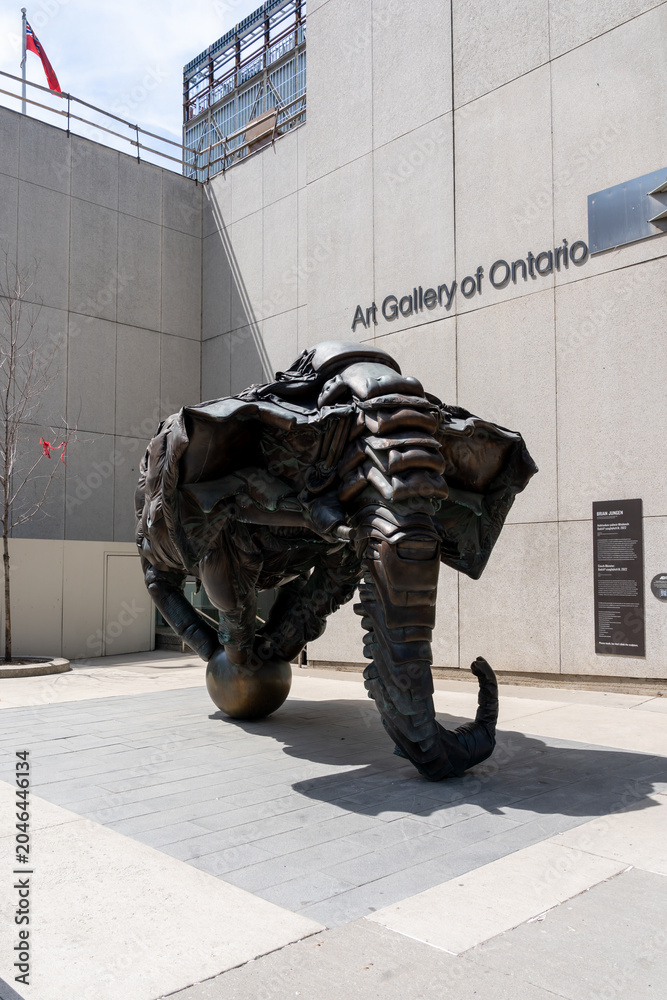 Naklejka premium Toronto, Ontario, Canada - June 2, 2026: Couch Monster Sculpture by artist Brian Jungen located outside the Art Gallery of Ontario in downtown Toronto, Ontario, Canada. 