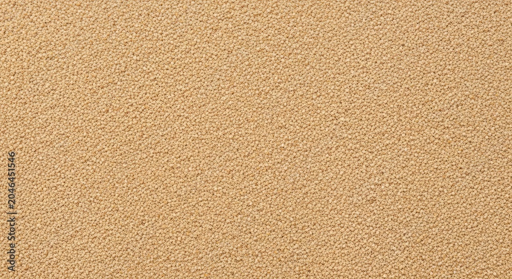 Fototapeta premium Quinoa seeds texture background healthy food ingredient close up view