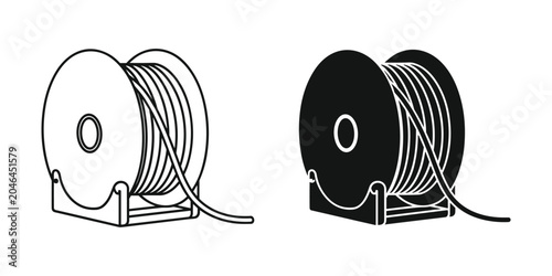 Obraz na płótnie Wire spool with cable unwinding during industrial use on a white background with