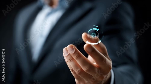 Man holds holographic target symbol in hand, demonstrating technology in a business setting