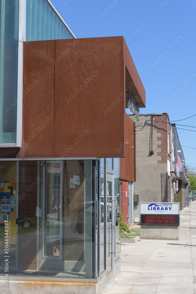 Obraz premium exterior sign and building facade of Toronto Public Library - Mount Dennis Branch, 1123 Weston Rd