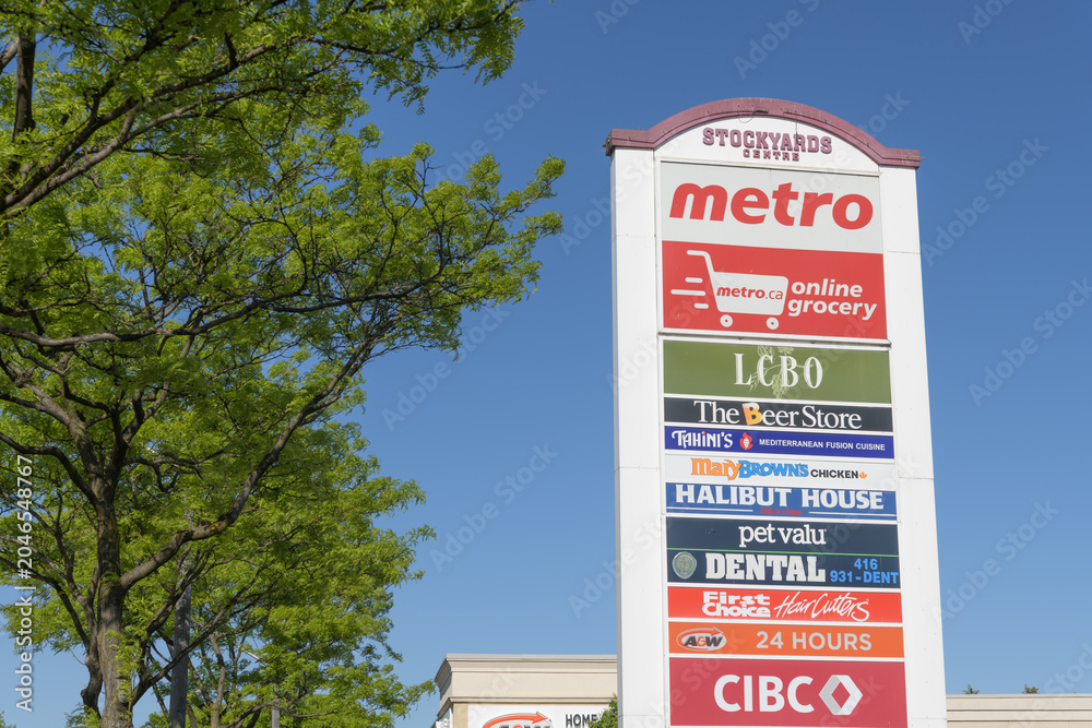 Naklejka premium road side pylon sign at Stockyards Centre with business directory at 2155 St Clair Av W, Toronto
