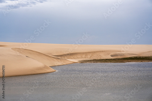 Dunes and lagoons of Atins, Lencois Maranhenses, Barreirinhas, Brazil. White sand dunes with pools of fresh water