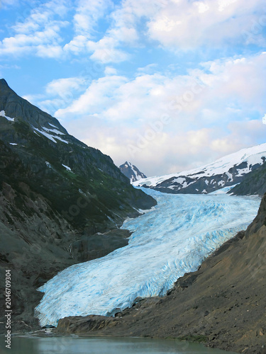 Image of Bear Glacier flowing down a valley just outside of Stewart, BC, Canada