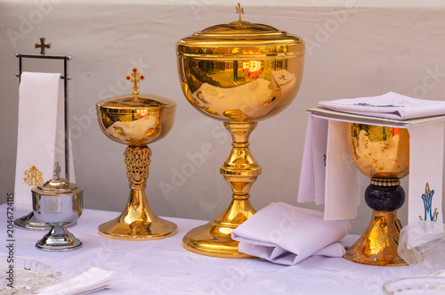 Obraz na plátně Catholic Eucharistic Vessels on Altar for Holy Communion and Sacred Liturgy