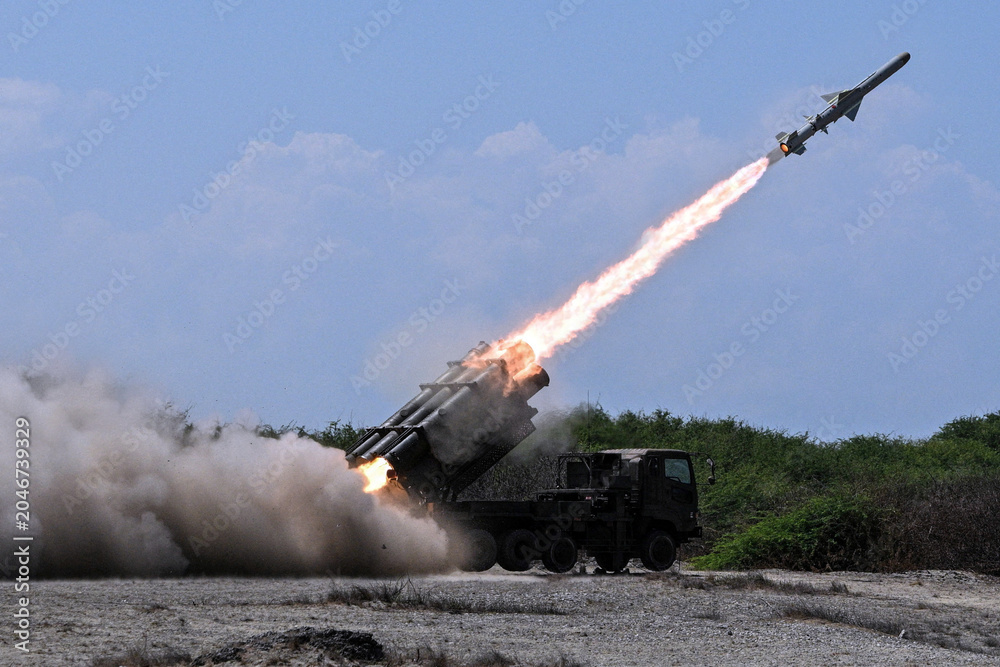 Fototapeta premium A missile launcher fires rockets during active military operations amid the ongoing Ukraine Russia conflict and the escalating Iran Israel military confrontation raising global fears of wider war