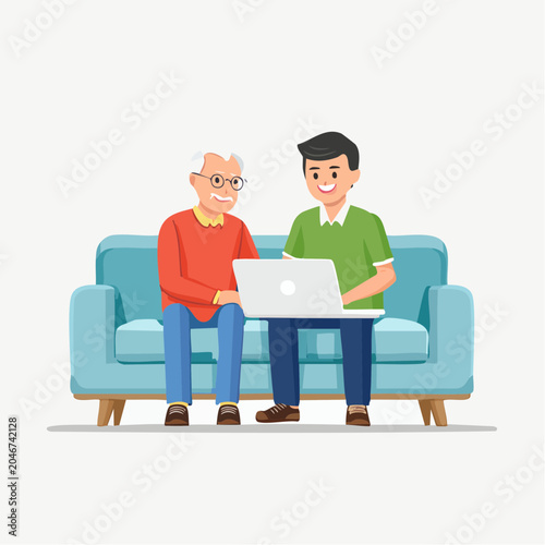 Grandfather and grandson using a laptop together on a couch