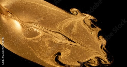 Abstract liquid gold flowing and swirling with shimmering texture, luxury elegant background animation
