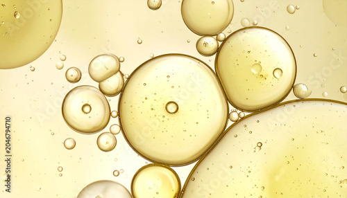 Macro Shot of Oil and Water Bubbles: A close-up abstract view of immiscible liquids, showing the fascinating spherical shapes of oil droplets suspended within water.