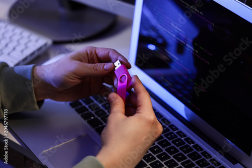 Female programmer's hands w...