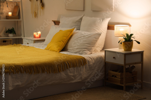 Interior of bedroom with ye...