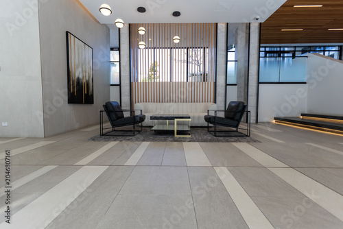 Modern Residential Lobby Interior with Lounge Seating Contemporary Apartment Building Entrance