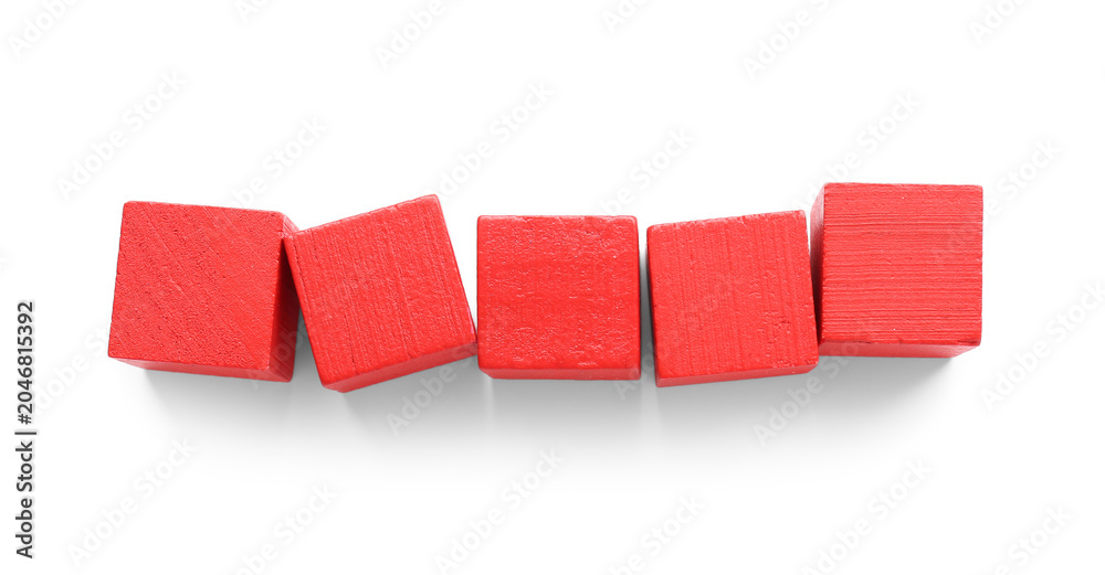Fototapeta premium Composition with red wooden blocks isolated on white background