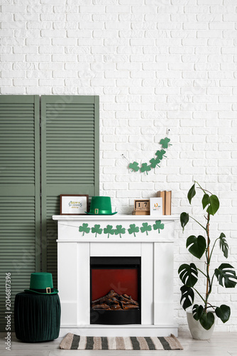 Interior of festive room decorated for St. Patrick's Day celebration with clo...