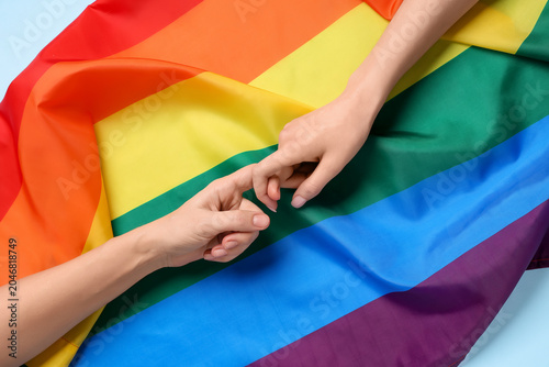 Female hands and rainbow fl...