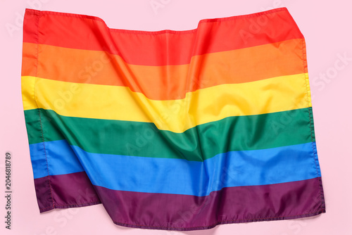 Rainbow flag on pink backgr...