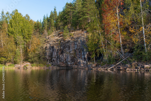 Photos Rocky shores of Lake Ladoga near the village of Lumivaara on a sunny autumn day,