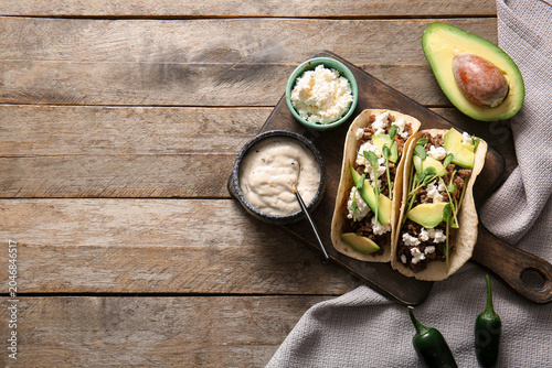 Tray with delicious tacos a...