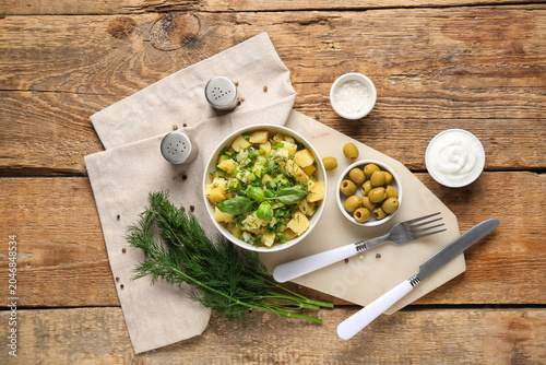 Bowl of tasty potato salad ...