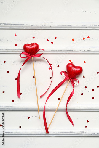 Composition with red hearts...