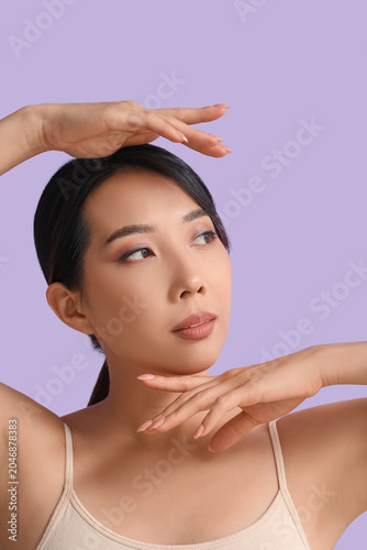 Beautiful young Asian woman...