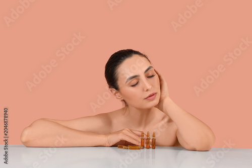 Beautiful young woman with ...
