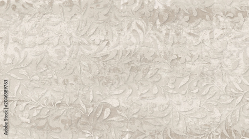 A seamless, textured vintage floral and vine pattern in warm beige and cream tones.