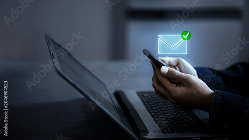 Email Verified Smartphone Glowing Envelope Green Checkmark Laptop Dark