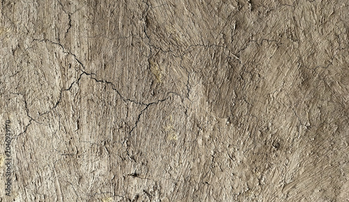 Canvastavla Mud wall texture background with rough clay surface and natural earthen pattern