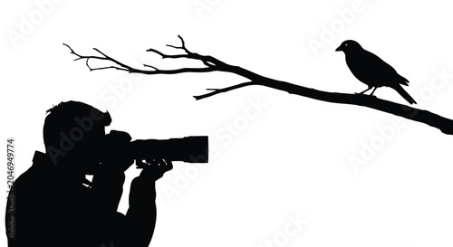 Photography wildlife scene with man taking picture of bird on branch