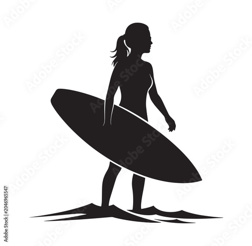 woman standing on beach holding surfboard under her arm in profile view